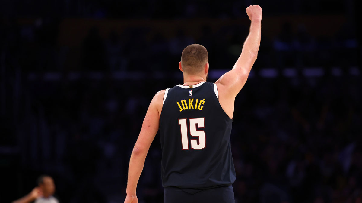 Denver Nuggets center Nikola Jokic (15) raises a hand after a play during the third quarter against the Los Angeles Lakers at Crypto.com Arena.