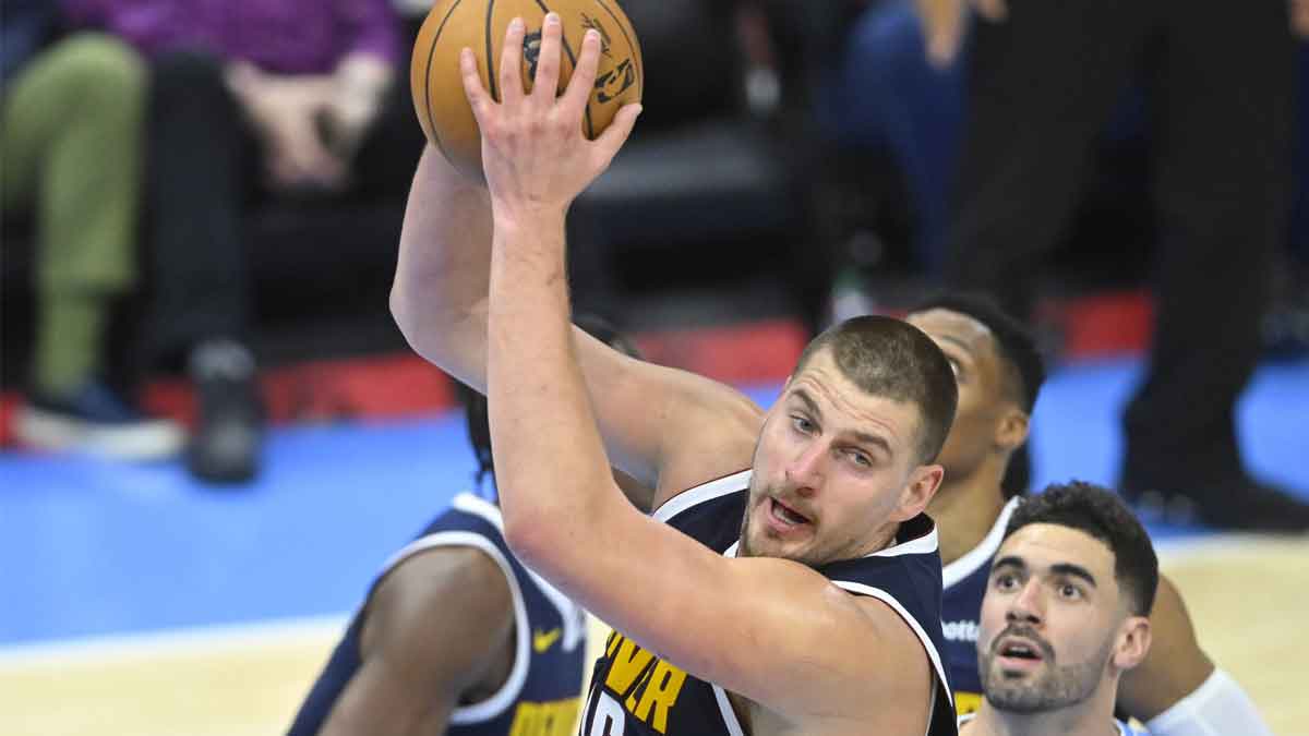 Denver Nuggets center Nikola Jokic (15) rebounds in the third quarter against the Cleveland Cavaliers at Rocket Mortgage FieldHouse.