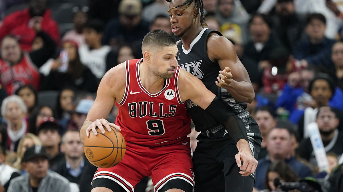 Chicago Bulls center Nikola Vucevic (9) drives to the basket while defended by San Antonio Spurs center Charles Bassey (28) during the second half at Frost Bank Center.
