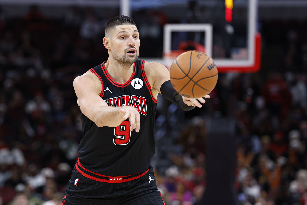 Chicago Bulls center Nikola Vucevic (9) passes the ball against the Indiana Pacers during the second half at United Center. 