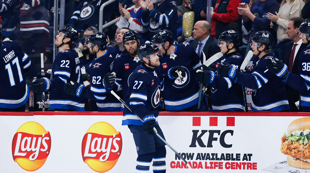 Winnipeg Jets forward Nikolaj Ehlers (27) celebrates with teammates after scoring a goal against the Minnesota Wild during the first period at Canada Life Centre.