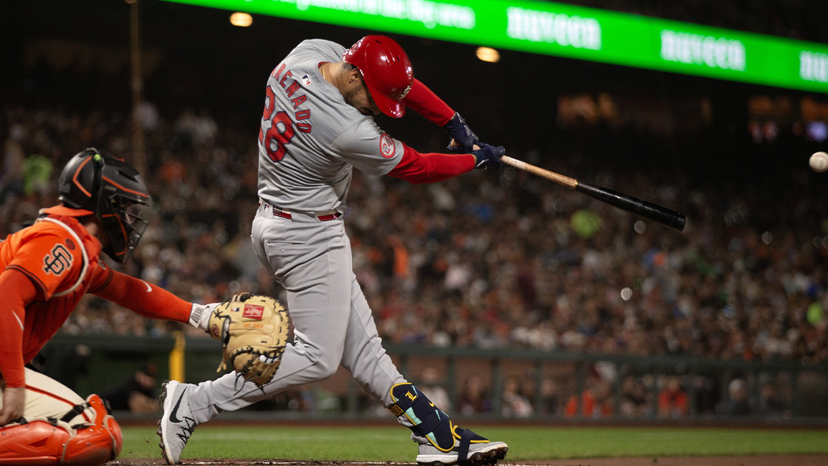 St. Louis Cardinals third baseman Nolan Arenado (28) hits a double against the San Francisco Giants during the fourth inning at Oracle Park