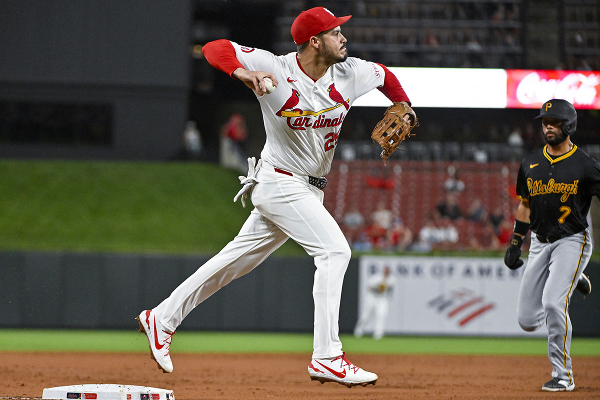 St. Louis Cardinals third baseman Nolan Arenado (28) forces out Pittsburgh Pirates shortstop Isiah Kiner-Falefa (7) and throws to first to complete the double play to end the third inning at Busch Stadium. 