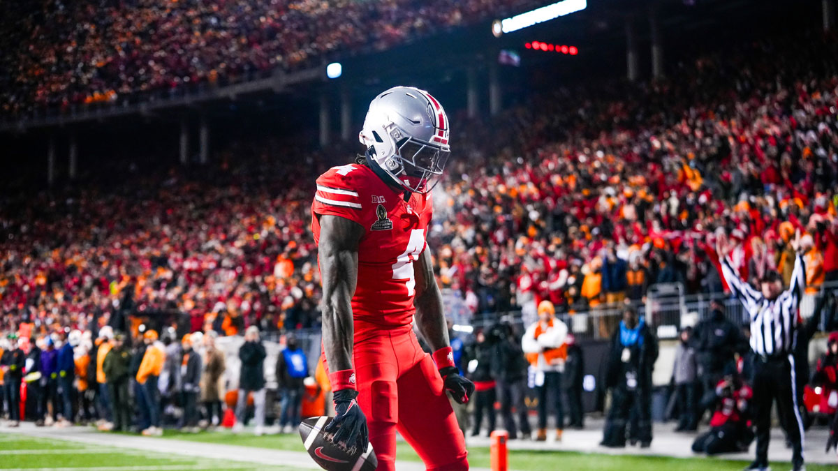 Ohio State Buckeyes wide receiver Jeremiah Smith (4) reacts after scoring a touchdown in the first half at Ohio Stadium