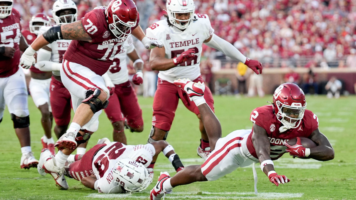 Oklahoma running back Jovantae Barnes (2) runs the ball in the first half of an NCAA football game between Oklahoma (OU) and Temple at the Gaylord Family Oklahoma Memorial Stadium in Norman, Okla., on Friday, Aug. 30, 2024.