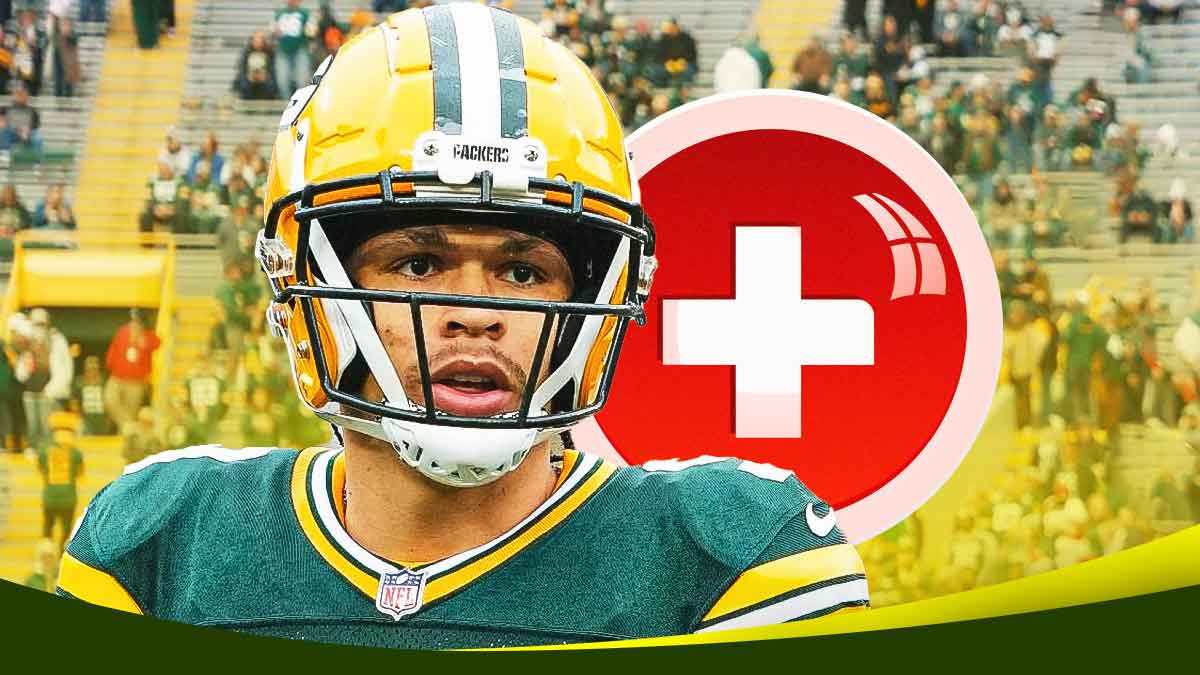 Christian Watson (Packers) with medical cross symbol