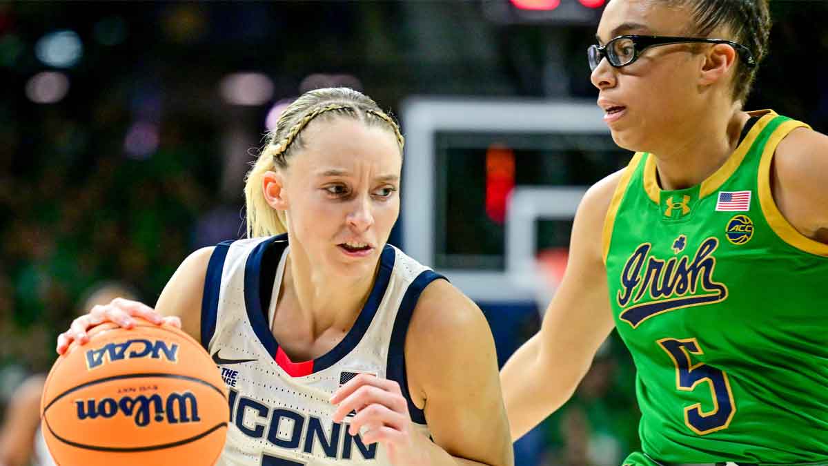 https://wp.clutchpoints.com/wp-content/uploads/2024/12/Paige-Bueckers-dribbles-the-basketball-against-Notre-Dame.jpg