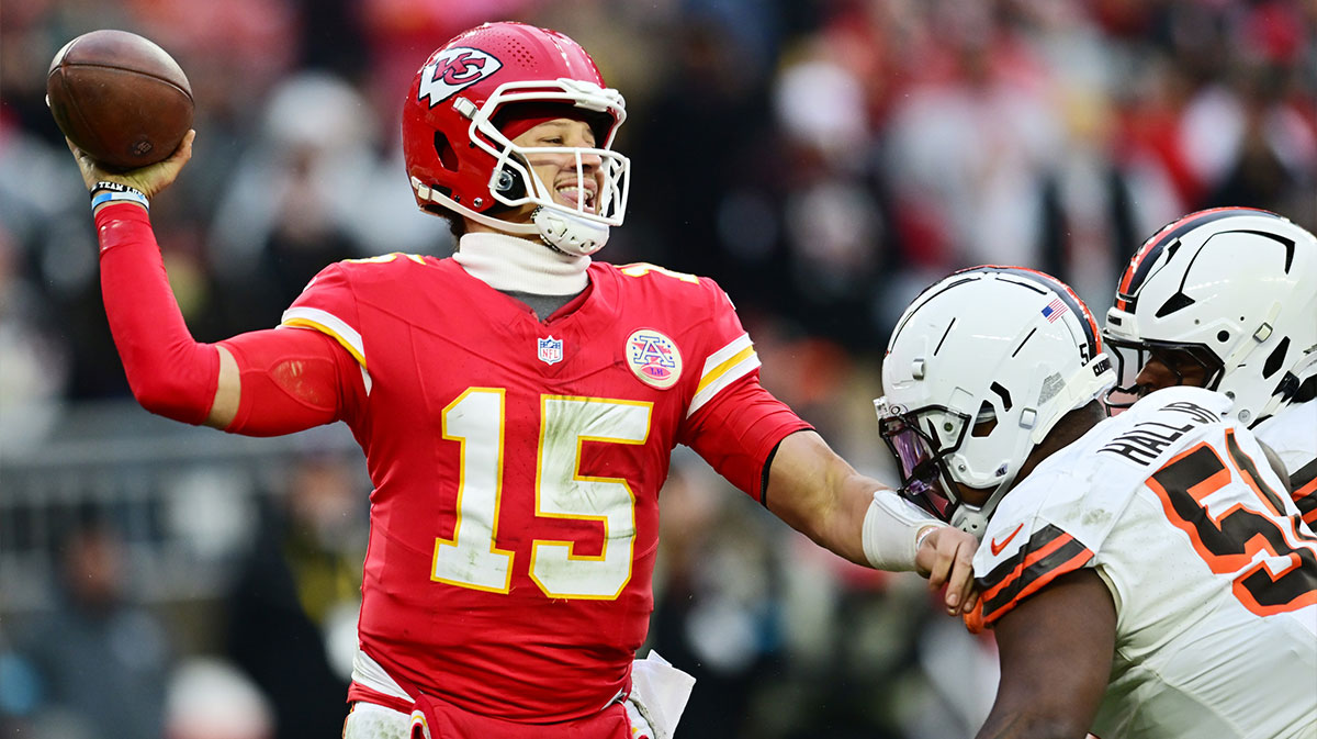 Cleveland Browns defensive tackle Mike Hall Jr. (51) and linebacker Devin Bush (30) rush Kansas City Chiefs quarterback Patrick Mahomes (15) during the second half at Huntington Bank Field.