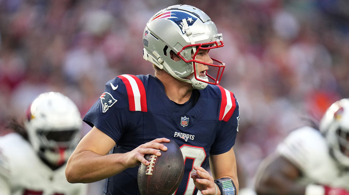 New England Patriots quarterback Drake Maye (10) scrambles out of the pocket against the Arizona Cardinals