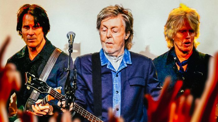 Paul McCartney in the middle of his guitarists for the 2024 Got Back Tour Rusty Anderson and Brian Ray.