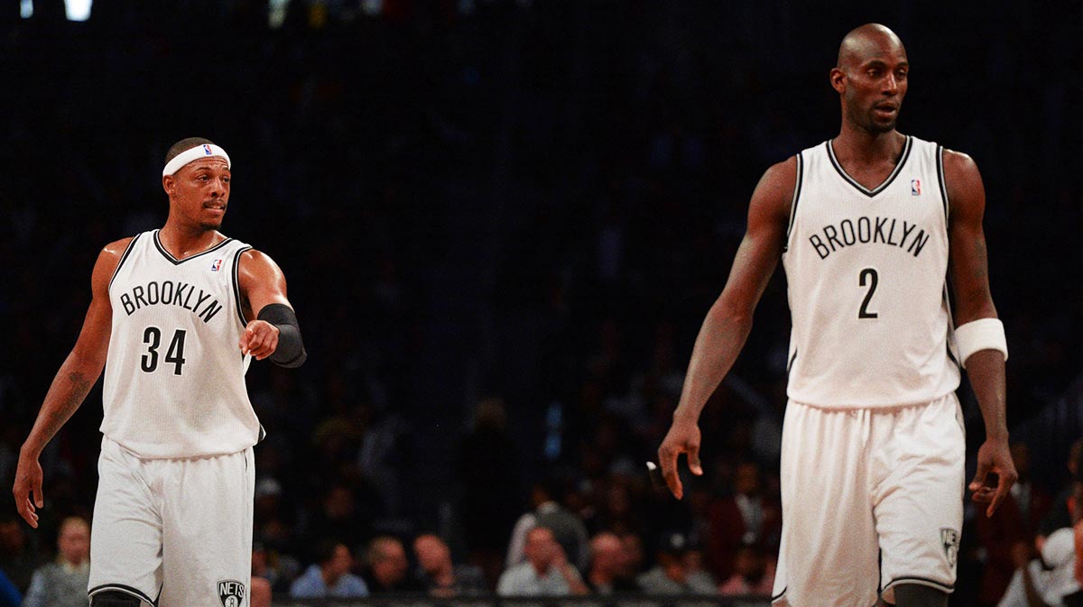 Brooklyn Nets small forward Paul Pierce (34) and power forward Kevin Garnett (2) looks on against the Los Angeles Lakers at Barclays Center. The Lakers won 99-94.