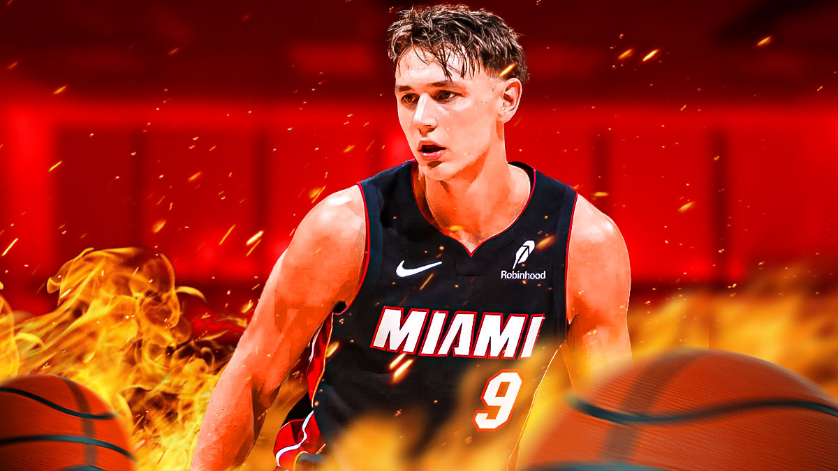 Miami Heat star Pelle Larsson with fire around him in front of Kaseya Center.