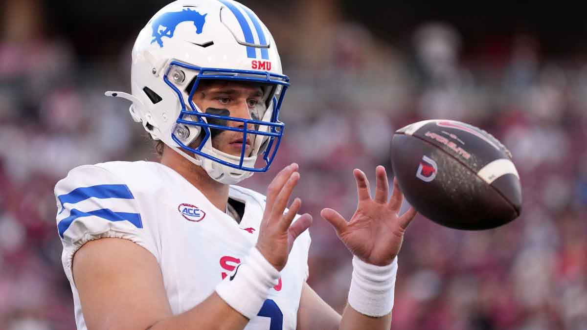 Southern Methodist Mustangs quarterback Preston Stone (2) warms up during the first quarter against the Stanford Cardinal at Stanford Stadium.