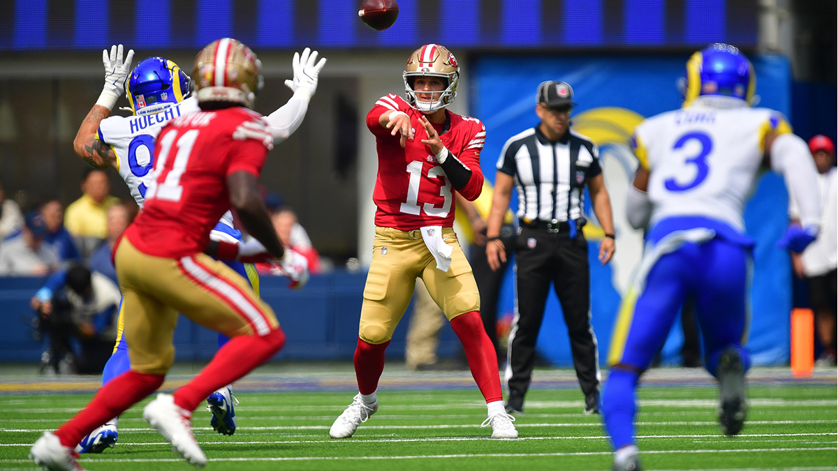 San Francisco 49ers quarterback Brock Purdy (13) throws a pass to wide receiver Brandon Aiyuk (11) against the Los Angeles Rams during the first half at SoFi Stadium.