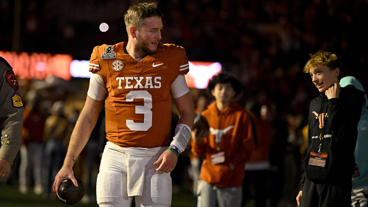 Texas Longhorns quarterback Quinn Ewers (3) walks off the field after UT defeats the Clemson Tigers in the CFP National Playoff first round game at Darrell K Royal-Texas Memorial Stadium.