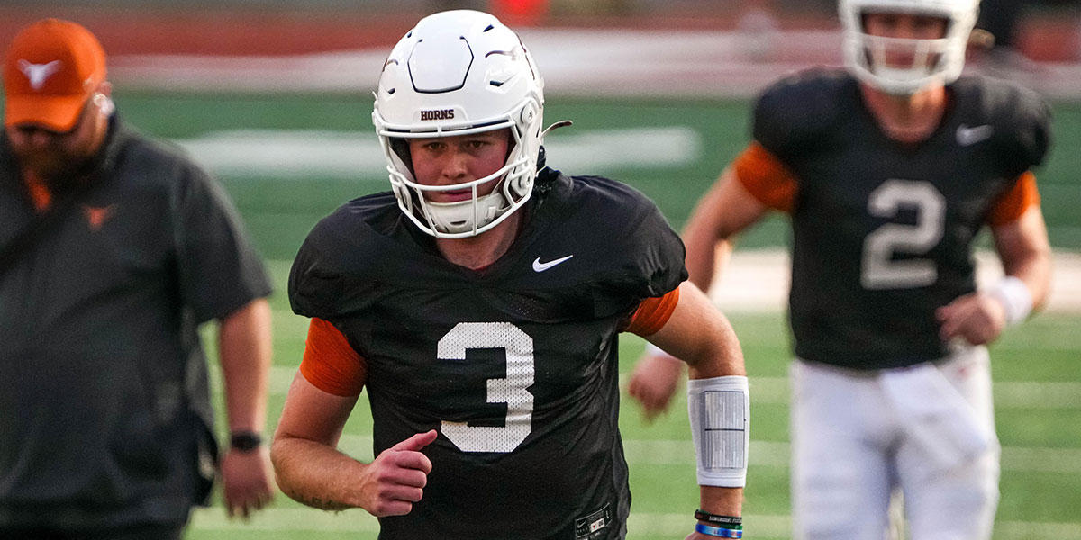 Texas Longhorns quarterback Quinn Ewers (3) runs the field during practice at Darrell K Royal-Texas Memorial Stadium in Austin Monday, Dec. 16, 2024.