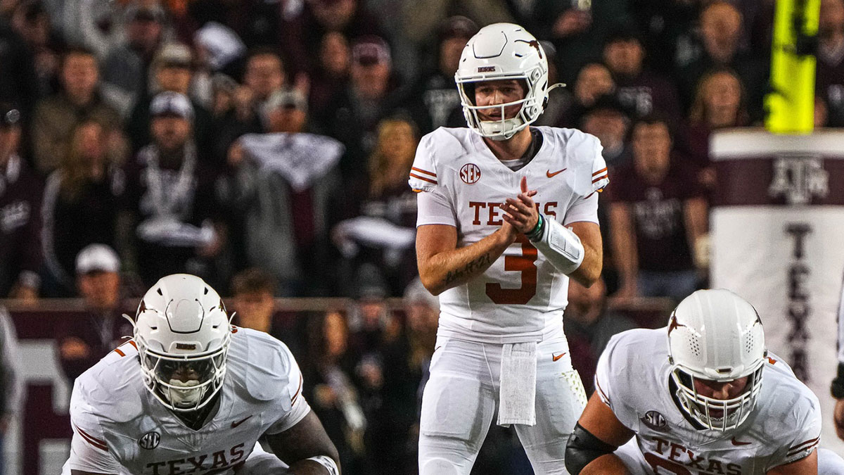 Texas Longhorns quarterback Quinn Ewers (3) against the Texas A&M Aggies at Kyle Field on Saturday, Nov. 30, 2024.