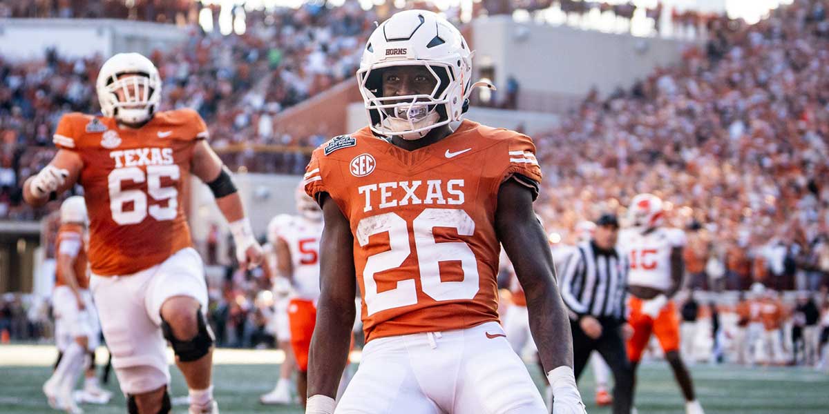 Texas Longhorns running back Quintrevion Wisner (26) celebrates scoring his second touchdown of the game in the second quarter as the Texas Longhorns play the Clemson Tigers in the first round of the College Football Playoffs at Darrell K Royal Texas Memorial Stadium in Austin, Texas, Dec. 21, 2024.