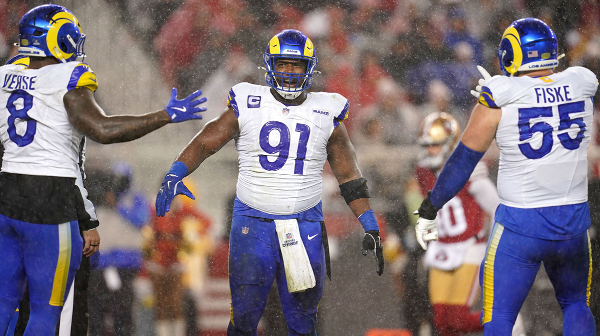 Los Angeles Rams defensive tackle Kobie Turner (91) reacts after recording a sack against the San Francisco 49ers in the second quarter at Levi's Stadium.