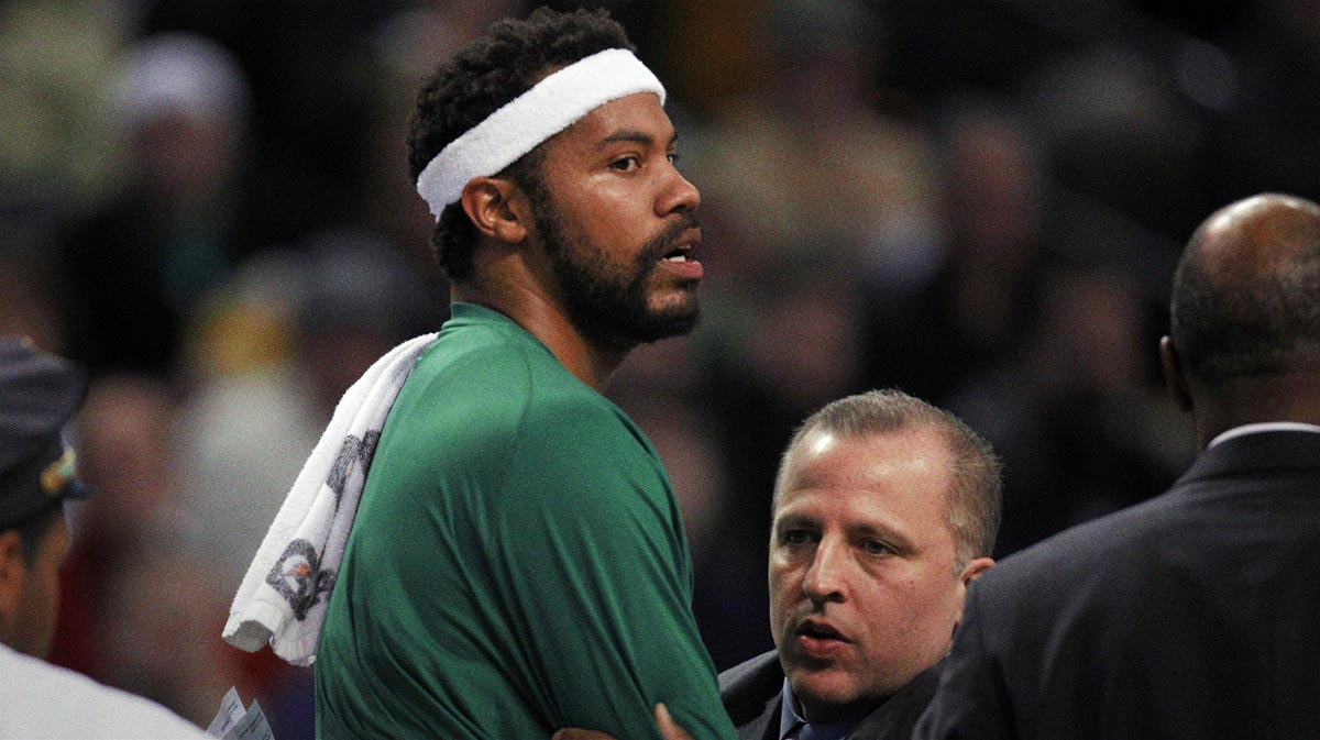 Boston Celtics center Rasheed Wallace (center) is ejected from the game as they take on the Philadelphia 76ers during the second quarter at the TD Banknorth Garden.