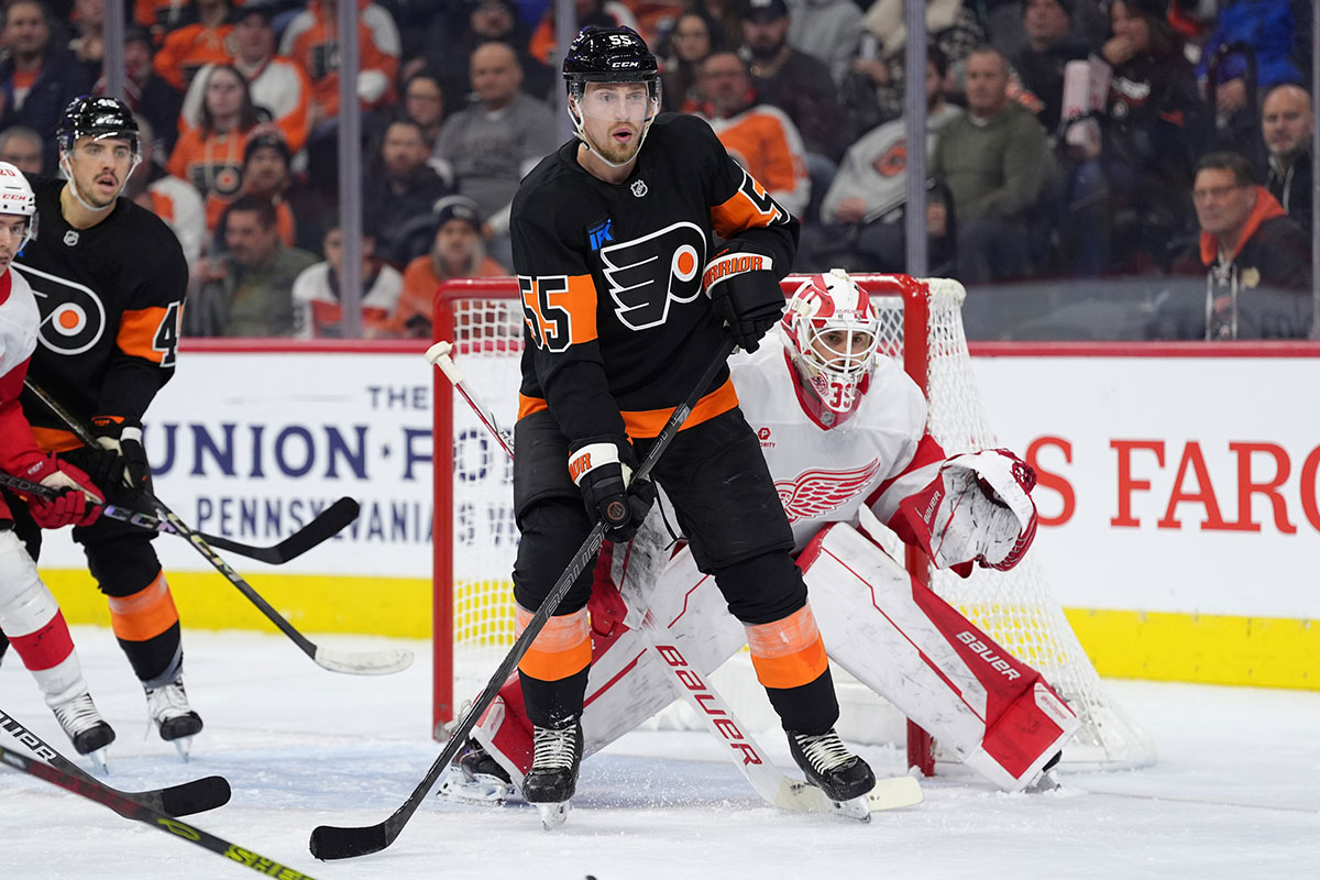 Philadelphia Flyers defenseman Rasmus Ristolainen (55) battles for position against Detroit Red Wings goalie Cameron Talbot (39) in the second period at Wells Fargo Center.