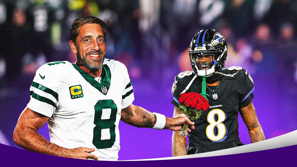 New York Jets QB Aaron Rodgers looking happy/smiling handing Baltimore Ravens QB Lamar Jackson flowers. Background is M&T Bank Stadium.