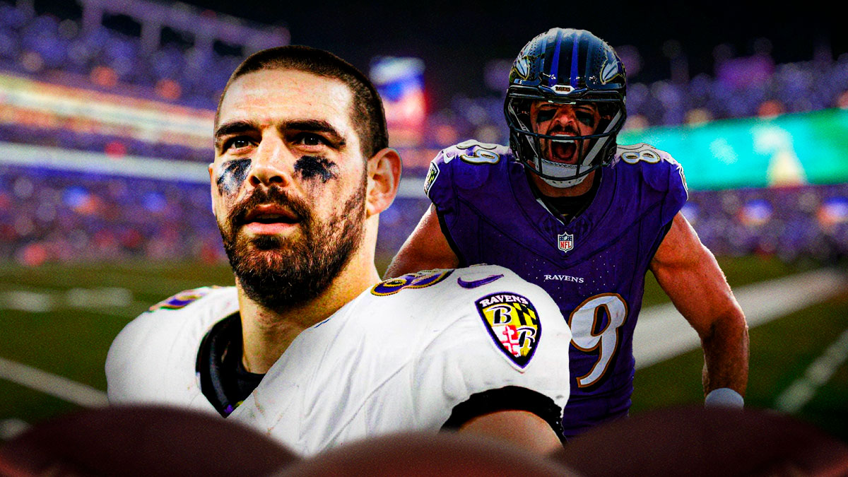 Ravens' Mark Andrews with arms in air celebrating