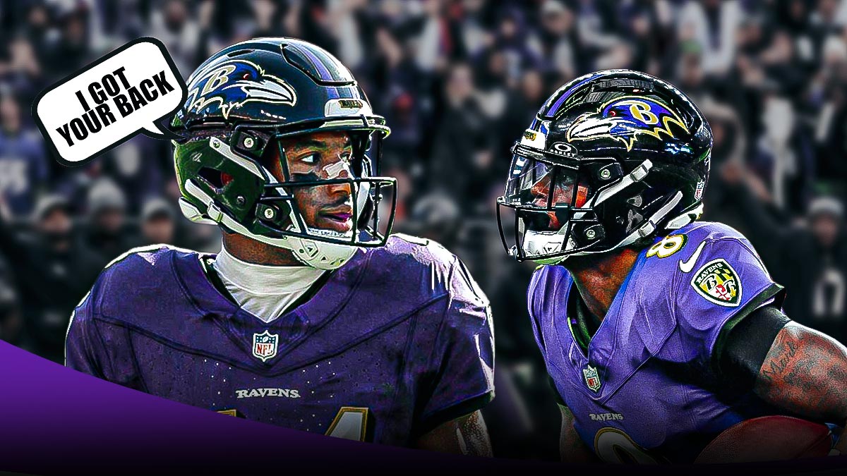 Ravens CB Marlon Humphrey smiling and pointing to QB Lamar Jackson saying, "I got your back". Background M&T Bank Stadium.