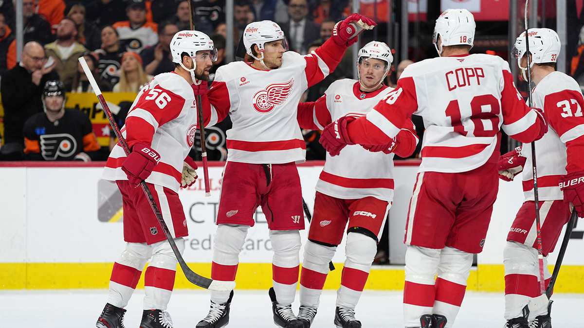 Detroit Red Wings defenseman Ben Chiarot (8) celebrates with teammates after scoring a goal against the Philadelphia Flyers in the third period at Wells Fargo Center.