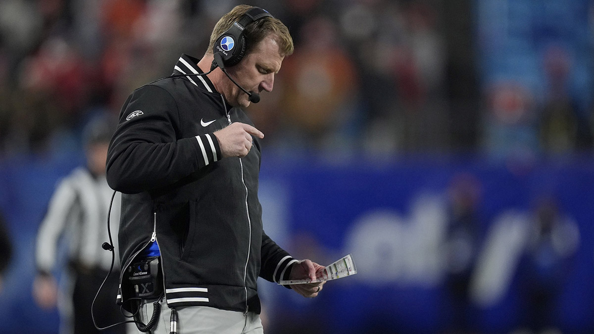Southern Methodist Mustangs head coach Rhett Lashlee calls a play during the first quarter against the Clemson Tigers in the 2024 ACC Championship game at Bank of America Stadium.