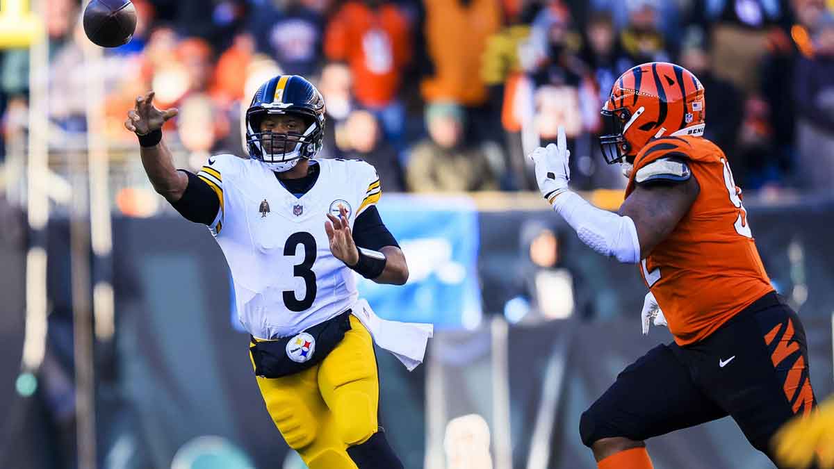 Dec 1, 2024; Cincinnati, Ohio, USA; Pittsburgh Steelers quarterback Russell Wilson (3) throws a pass against the Cincinnati Bengals in the first half at Paycor Stadium. 