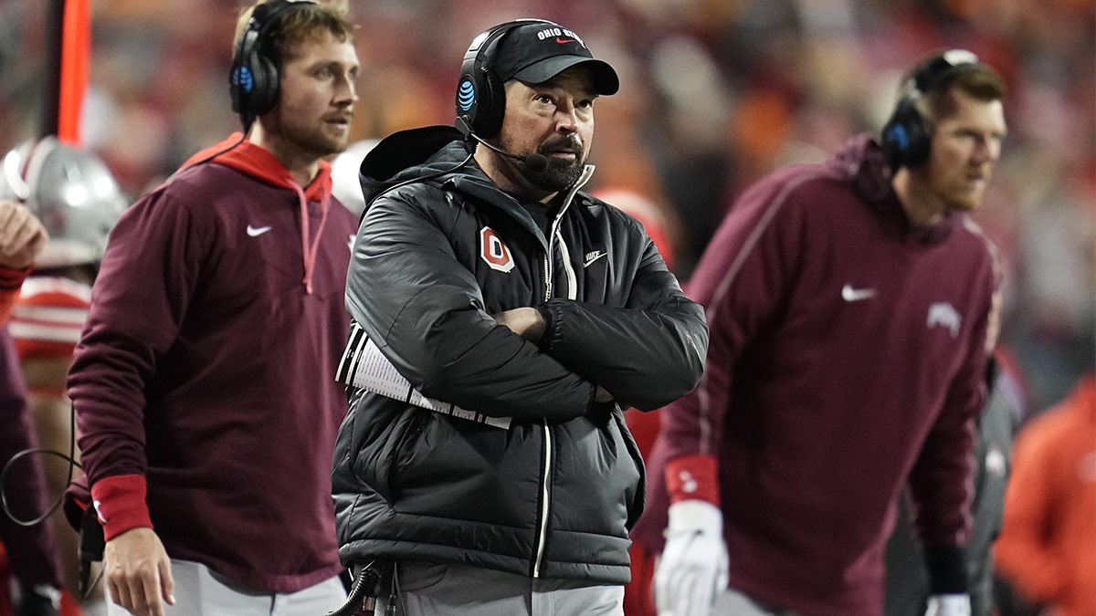 Ohio State Buckeyes head coach Ryan Day watches from the sideline during the first half of a College Football Playoff first round game against the Tennessee Volunteers at Ohio Stadium.