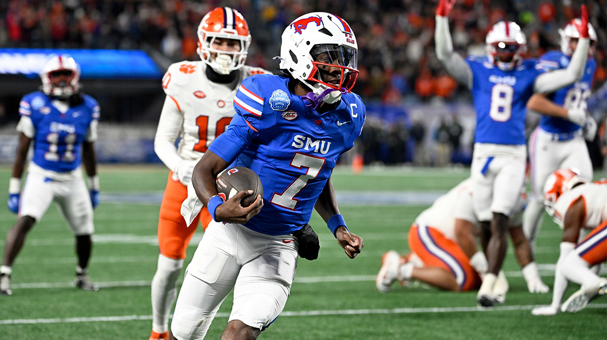 Southern Methodist Mustangs quarterback Kevin Jennings (7) runs for a touchdown during the first quarter against the Clemson Tigers in the 2024 ACC Championship game at Bank of America Stadium.