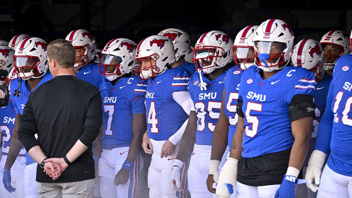 Nov 30, 2024; Dallas, Texas, USA; Southern Methodist Mustangs head coach Rhett Lashlee prepares to lead the Mustangs on to the field before the game between the SMU Mustangs and the California Golden Bears at Gerald J. Ford Stadium. Mandatory Credit: Jerome Miron-Imagn Images