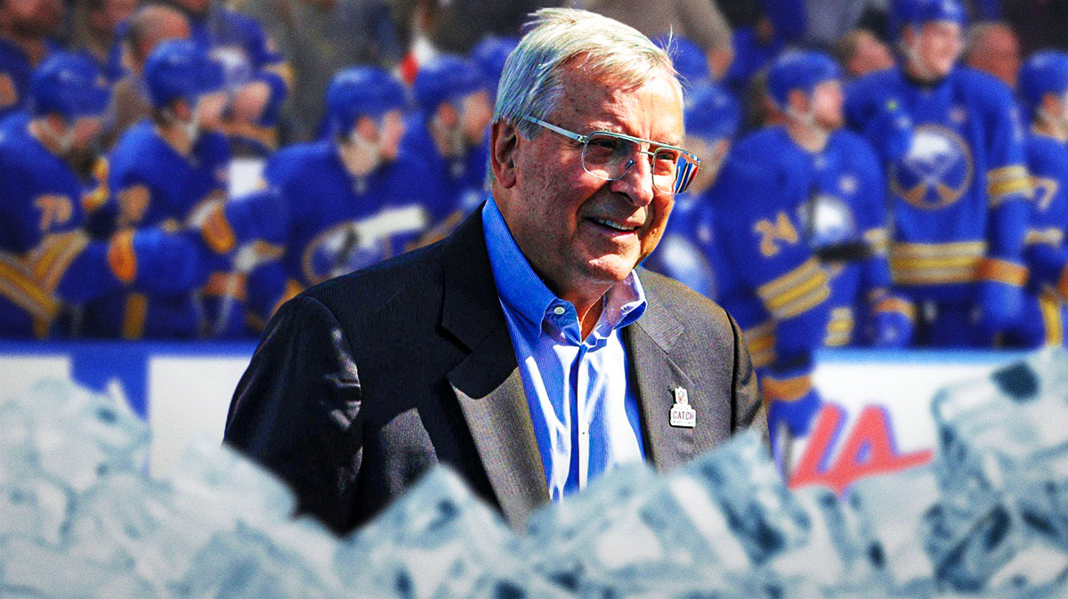 Sabres owner Terry Pegula in front of dejected Sabres players