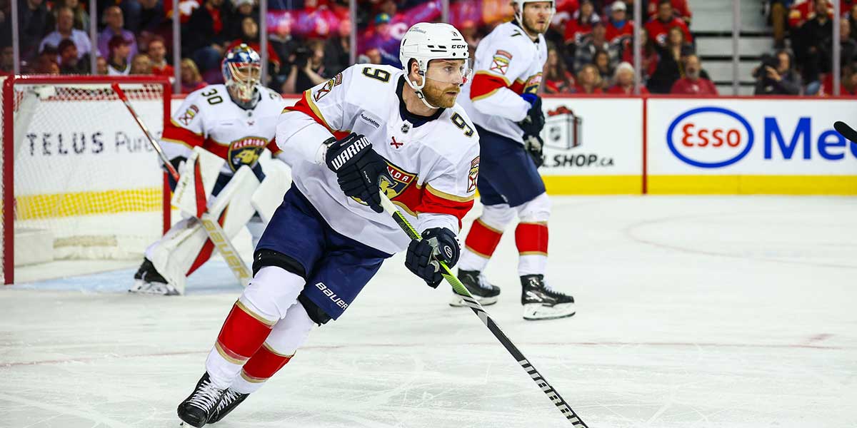 Florida Panthers center Sam Bennett (9) skates with the puck against the Calgary Flames during the second period at Scotiabank Saddledome.