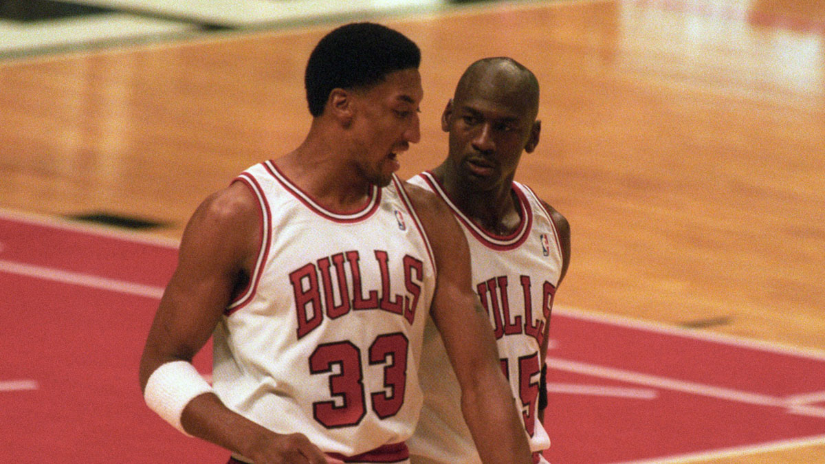 Chicago Bulls guard Michael Jordan (45) talks with forward Scottie Pippen (33) after a timeout from the game against the Boston Celtics at Chicago Stadium. The Bulls beat the Celtics 100-82. 