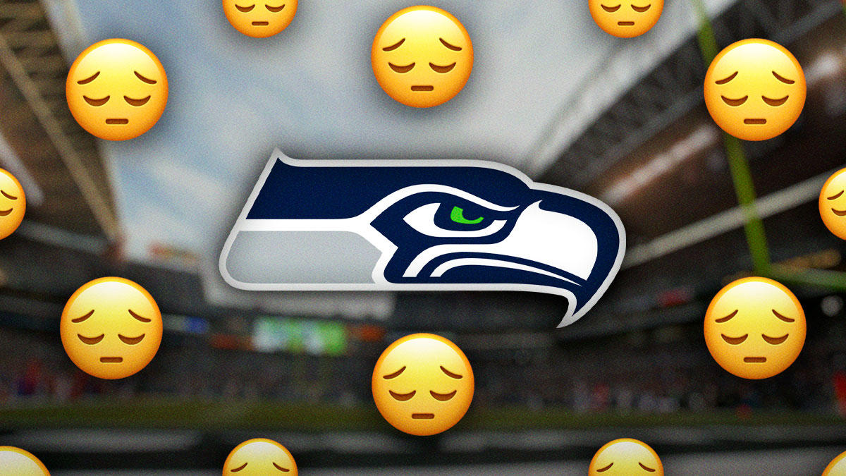 Seattle Seahawks logo with sad face emojis surrounding it.
