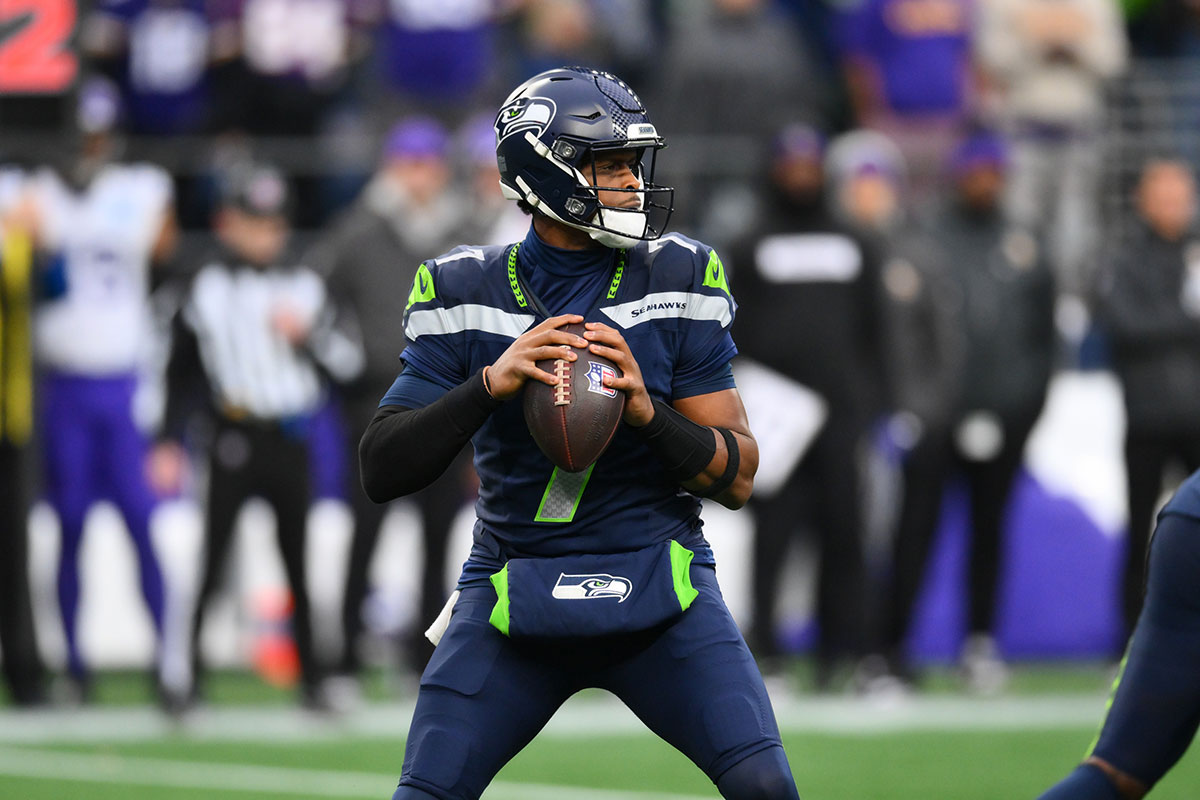 Seattle Seahawks quarterback Geno Smith (7) looks to pass the ball against the Minnesota Vikings during the second half at Lumen Field.