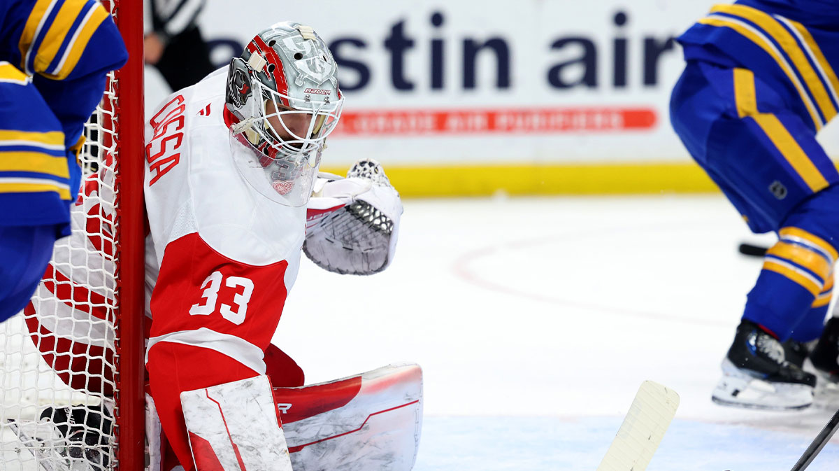 Detroit Red Wings goaltender Sebastian Cossa (33) looks for the puck during the second period against the Buffalo Sabres at KeyBank Center.