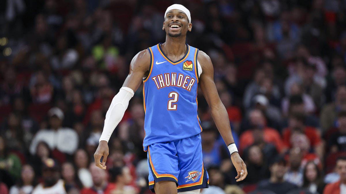 Oklahoma City Thunder guard Shai Gilgeous-Alexander (2) reacts after scoring a basket during the first quarter against the Houston Rockets at Toyota Center.