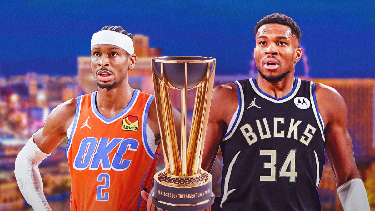 Thunder All-Star Shai Gilgeous-Alexander next to Bucks superstar Giannis Antetokounmpo with the NBA Cup trophy (not the Larry O'Brien trophy) with the Las Vegas skyline in the background