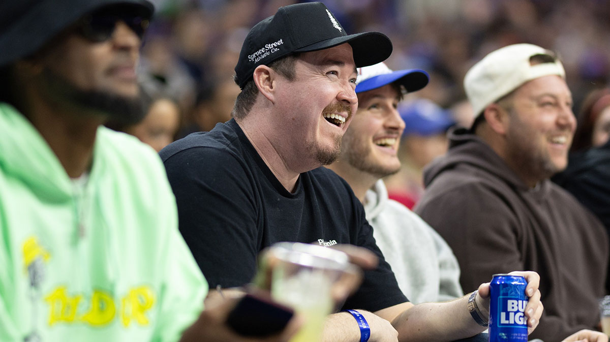 Comedian Shane Gillis (M) looks on during the second quarter of action between the Philadelphia 76ers and the Memphis Grizzlies at Wells Fargo Center.