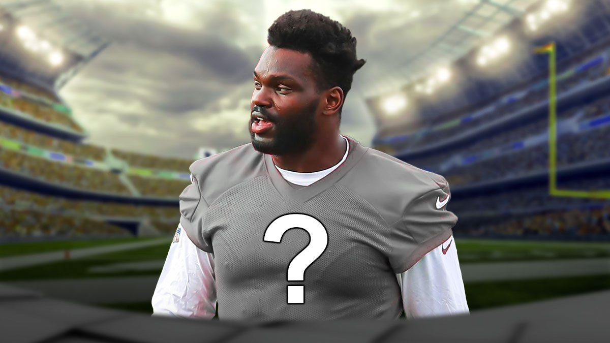 Shaq Barrett wearing a grey jersey with a question mark where the number would go.
