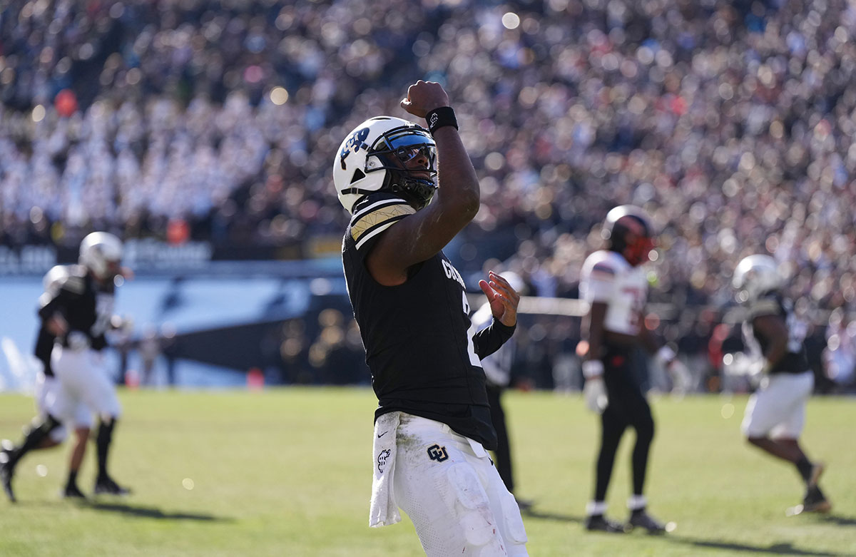 Shedeur Sanders celebrating a touchdown against Oklahoma State.