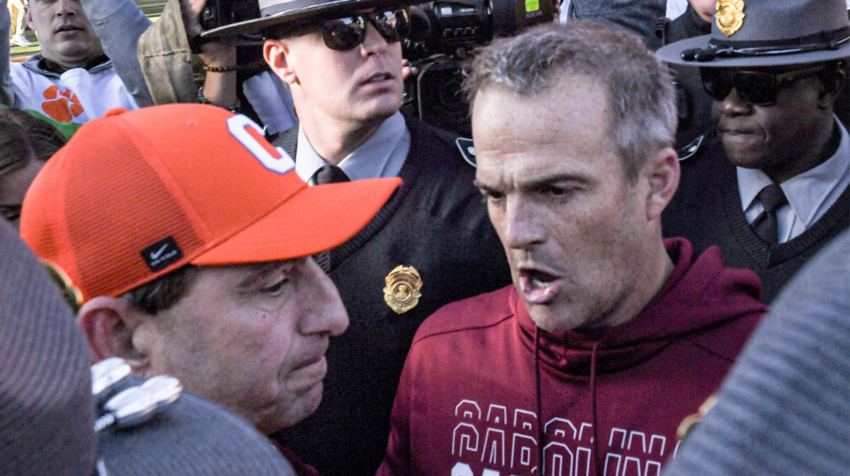 Clemson head coach Dabo Swinney and South Carolina Head Coach Shane Beamer talk after the game at Memorial Stadium