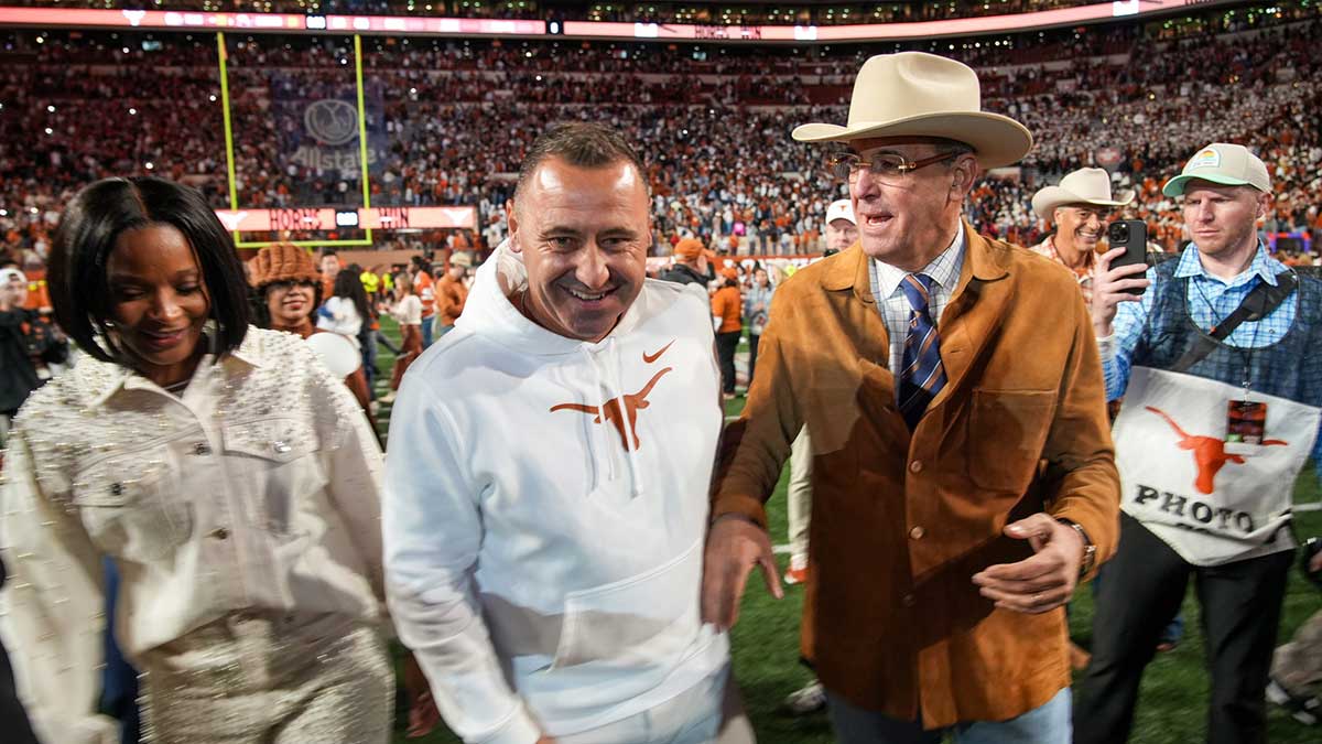Texas Longhorns head coach Steve Sarkisian and Chris Del Conte celebrate a win over Clemson Tigers 38-24 in the NCAA College Football Playoffs first round game at Darrell K Royal Texas Memorial Stadium, Austin, Texas, Saturday, Dec. 21, 2024.