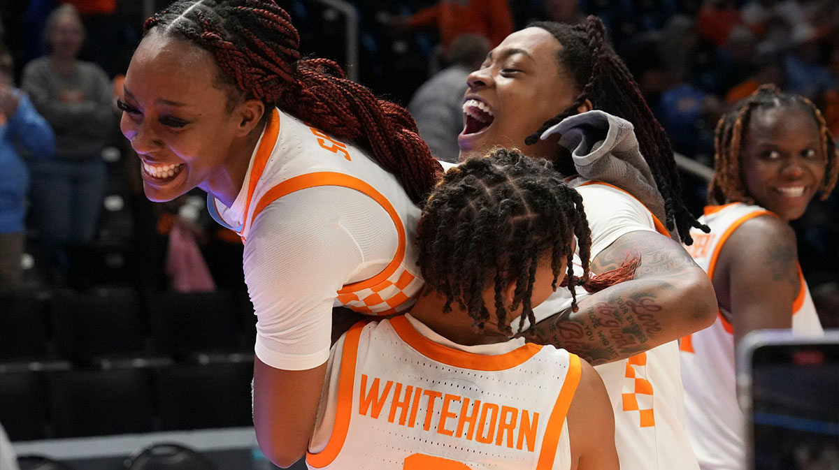 Tennessee's Samara Spencer (7) is carried off the court by Ruby Whitehorn (2) and Zee Spearman (11) after the NCAA college basketball game against North Carolina Central.