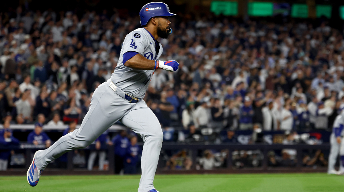 Los Angeles Dodgers outfielder Teoscar Hernandez (37) hits a two-RBI double during the fifth inning against the New York Yankees in game five of the 2024 MLB World Series at Yankee Stadium. 