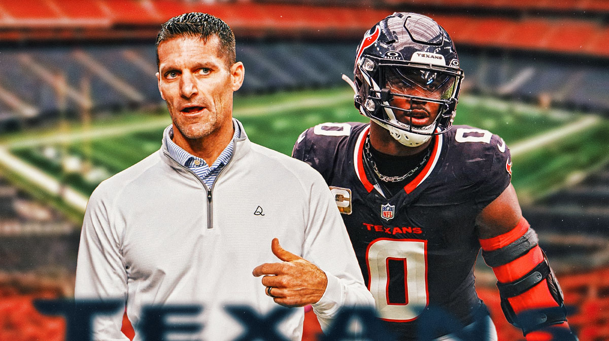 Houston Texans general manager Nick Caserio and Azeez Al-Shaair in front of NRG Stadium.